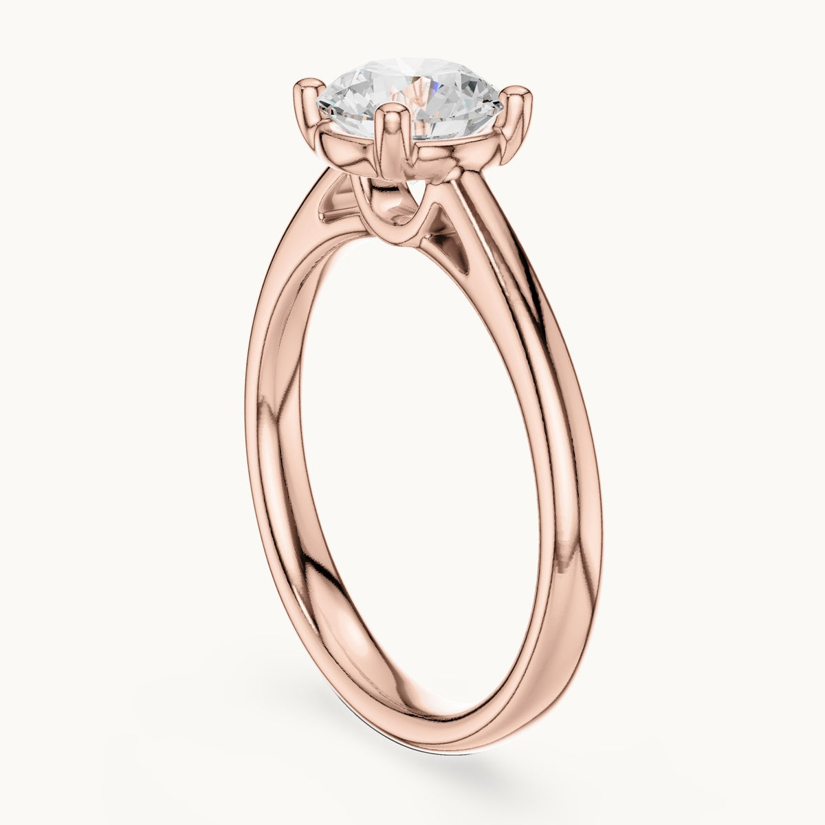 Round lab-grown diamond loop-gallery four-prong solitaire engagement ring in rose gold, 1.10 CT TW, view 1
