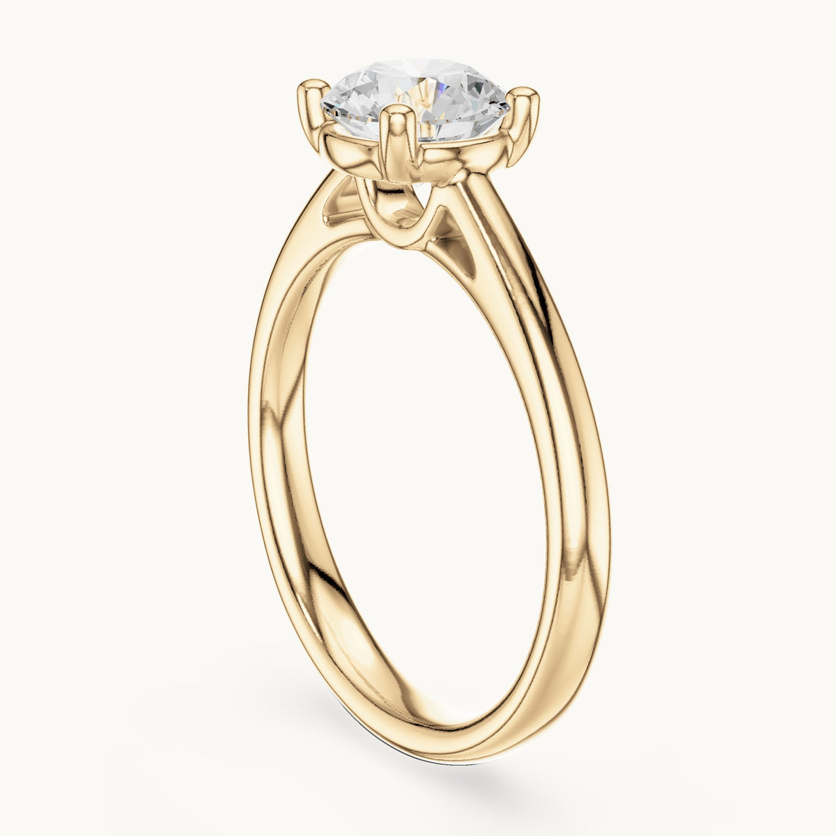 Round lab-grown diamond loop-gallery four-prong solitaire engagement ring in yellow gold, 1.10 CT TW, view 1