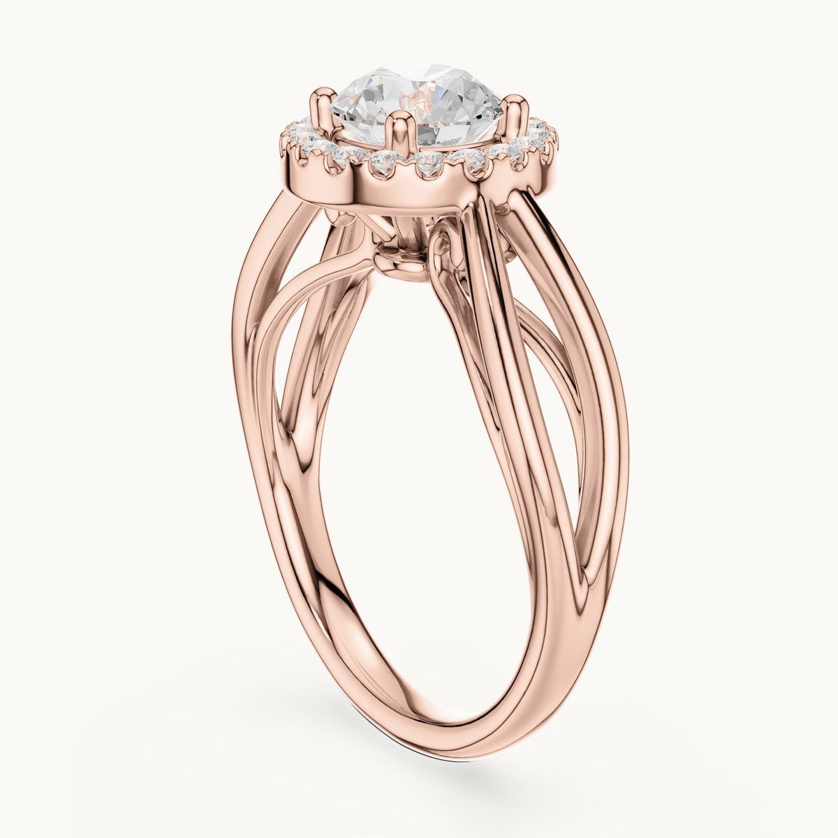 Round lab-grown diamond halo engagement ring with twisted split shank in rose gold, 1.16 CT TW, view 1