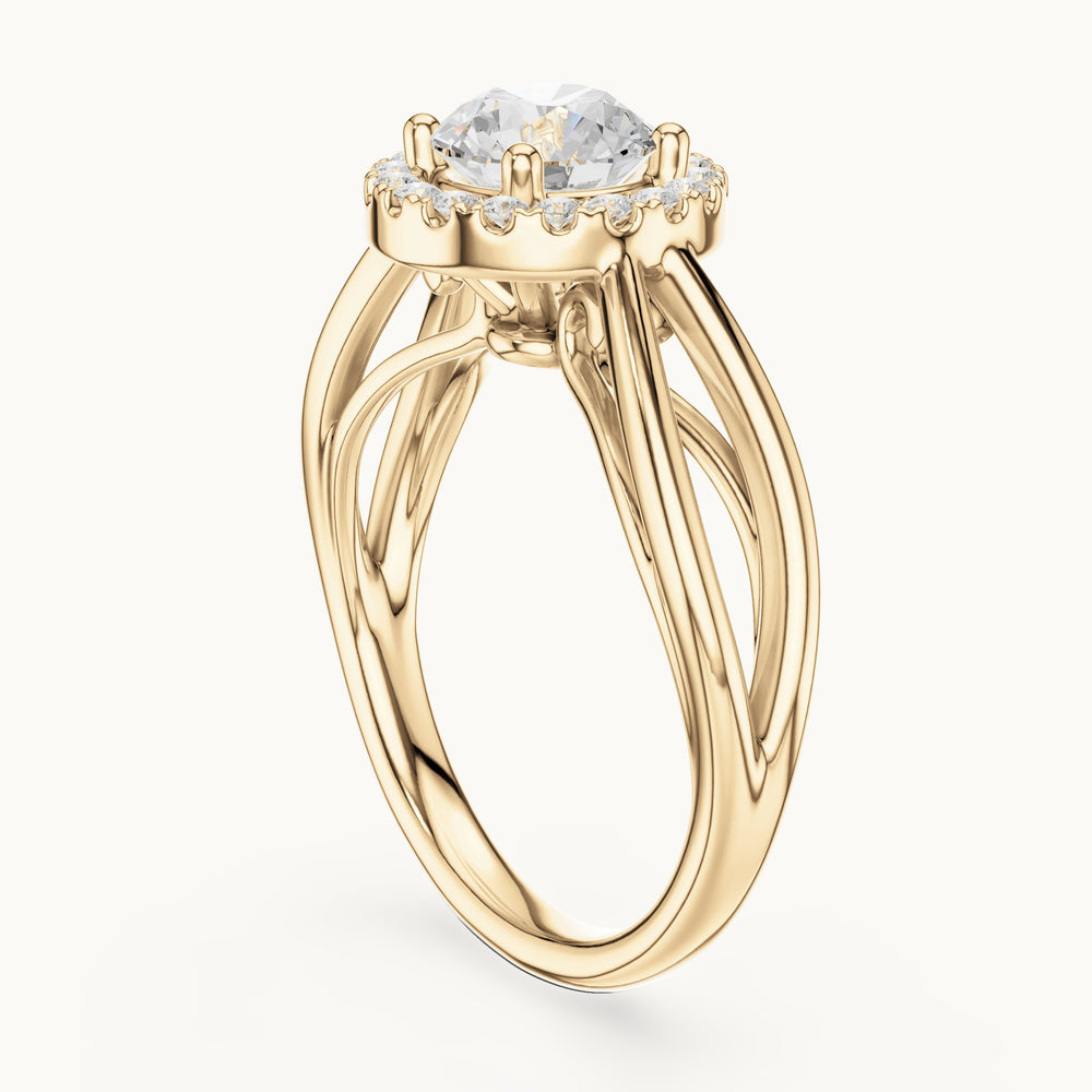 Round lab-grown diamond halo engagement ring with twisted split shank in yellow gold, 1.16 CT TW, view 1