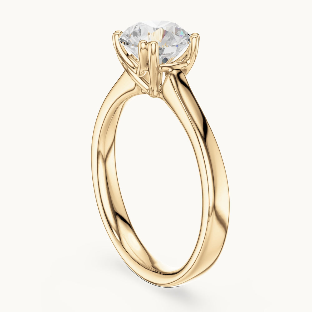 Round lab-grown diamond scroll-gallery four-prong solitaire engagement ring in yellow gold, 1.10 CT TW, view 1