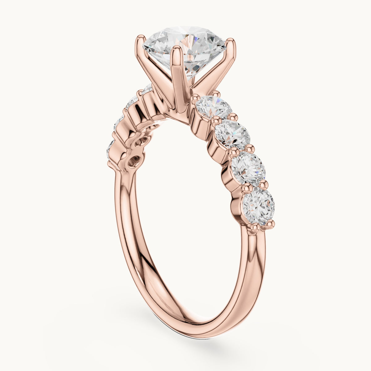Round lab-grown diamond graduated side stone engagement ring in rose gold, 2.13 CT TW, view 1