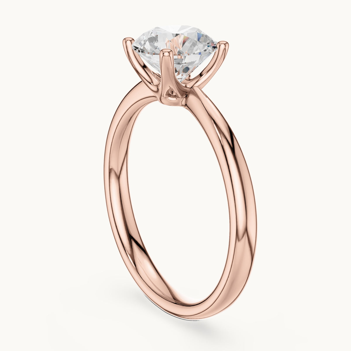 Round lab-grown diamond pinched-gallery four-prong solitaire engagement ring in rose gold, 1.44 CT TW, view 1