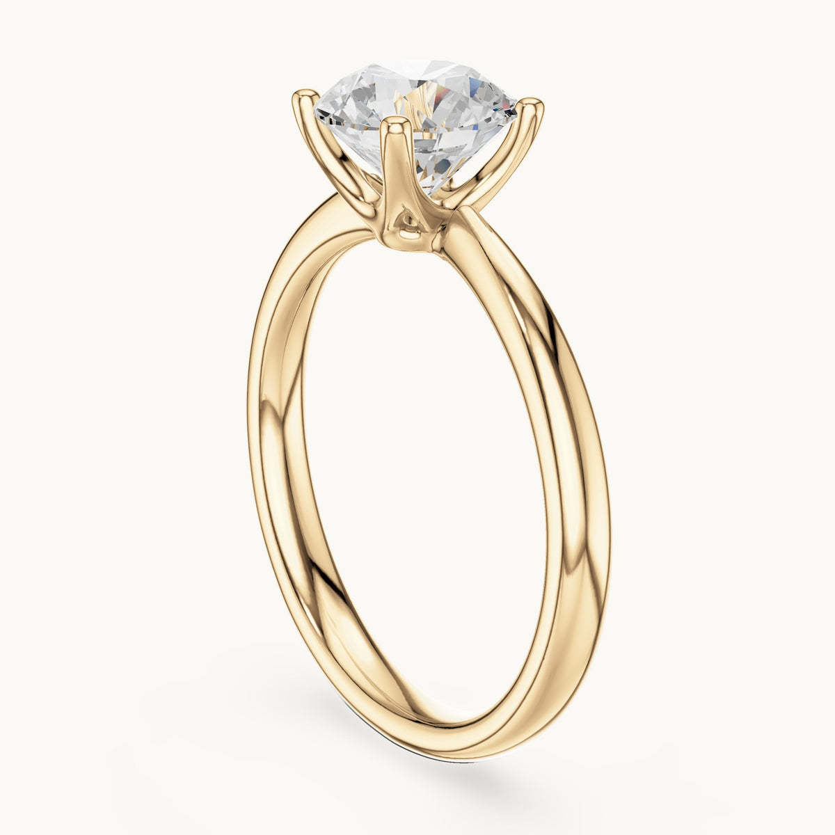 Round lab-grown diamond pinched-gallery four-prong solitaire engagement ring in yellow gold, 1.44 CT TW, view 1