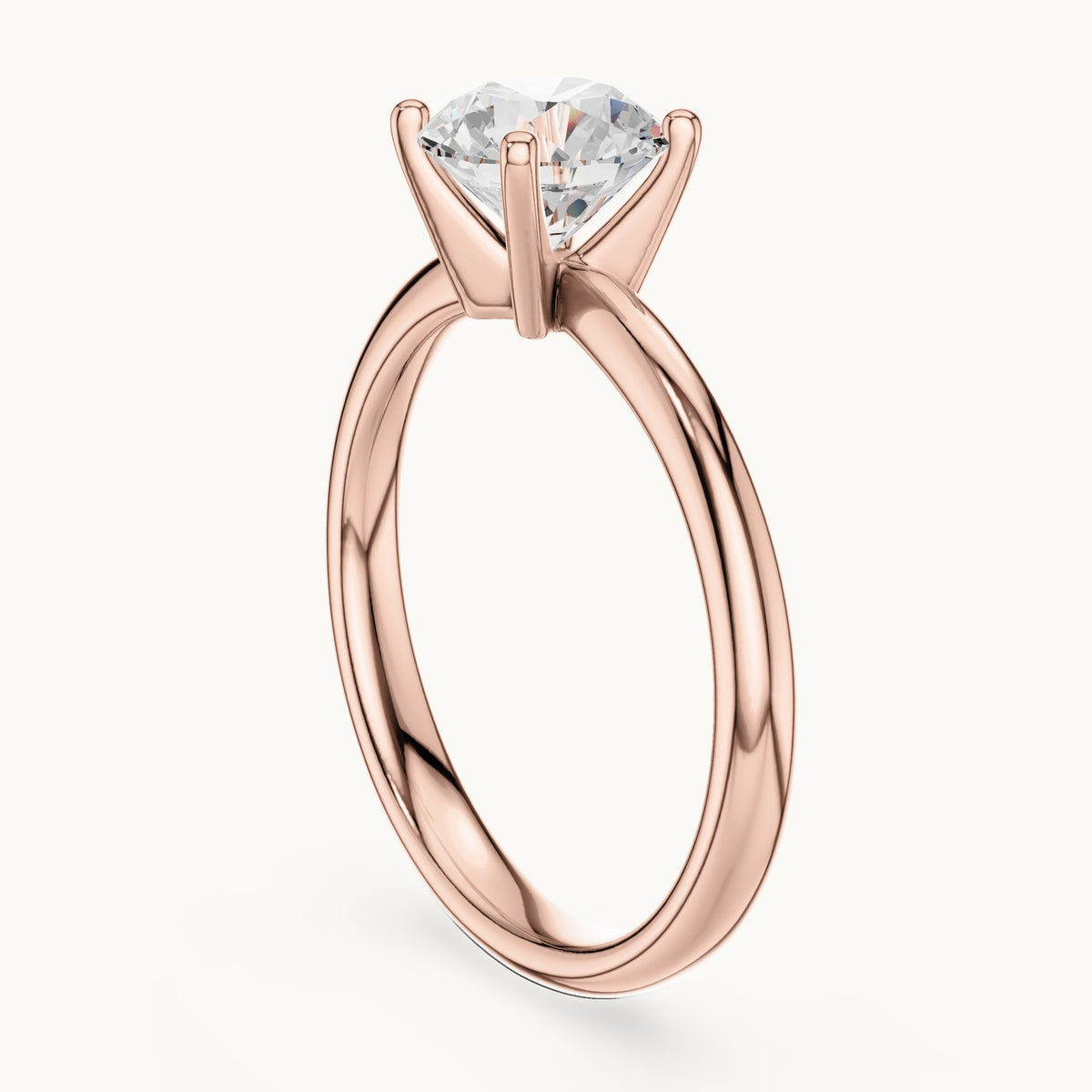 Round lab-grown diamond classic four-prong solitaire engagement ring in rose gold, 1.17 CT TW, view 1
