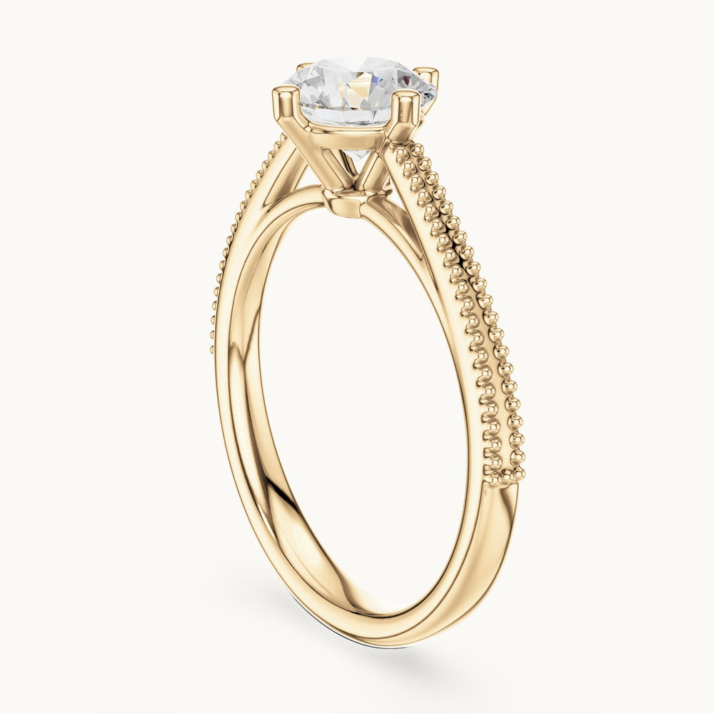 Round lab-grown diamond milgrain-band four-prong solitaire engagement ring in yellow gold, 0.85 CT TW, view 1