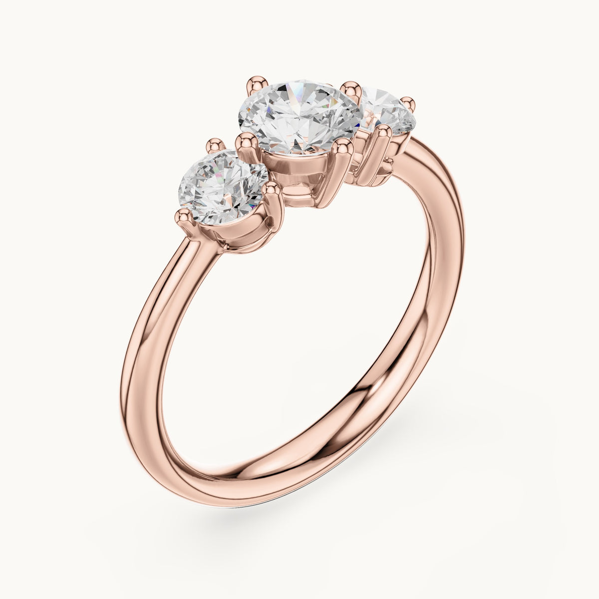 Round lab-grown diamond three-stone engagement ring in rose gold, 1.29 CT TW, view 2