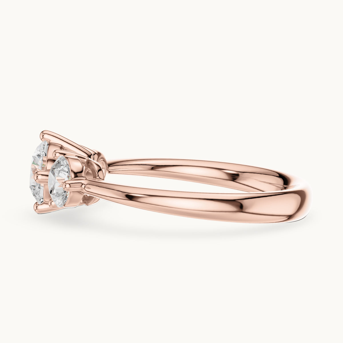 Round lab-grown diamond three-stone engagement ring in rose gold, 1.29 CT TW, view 3