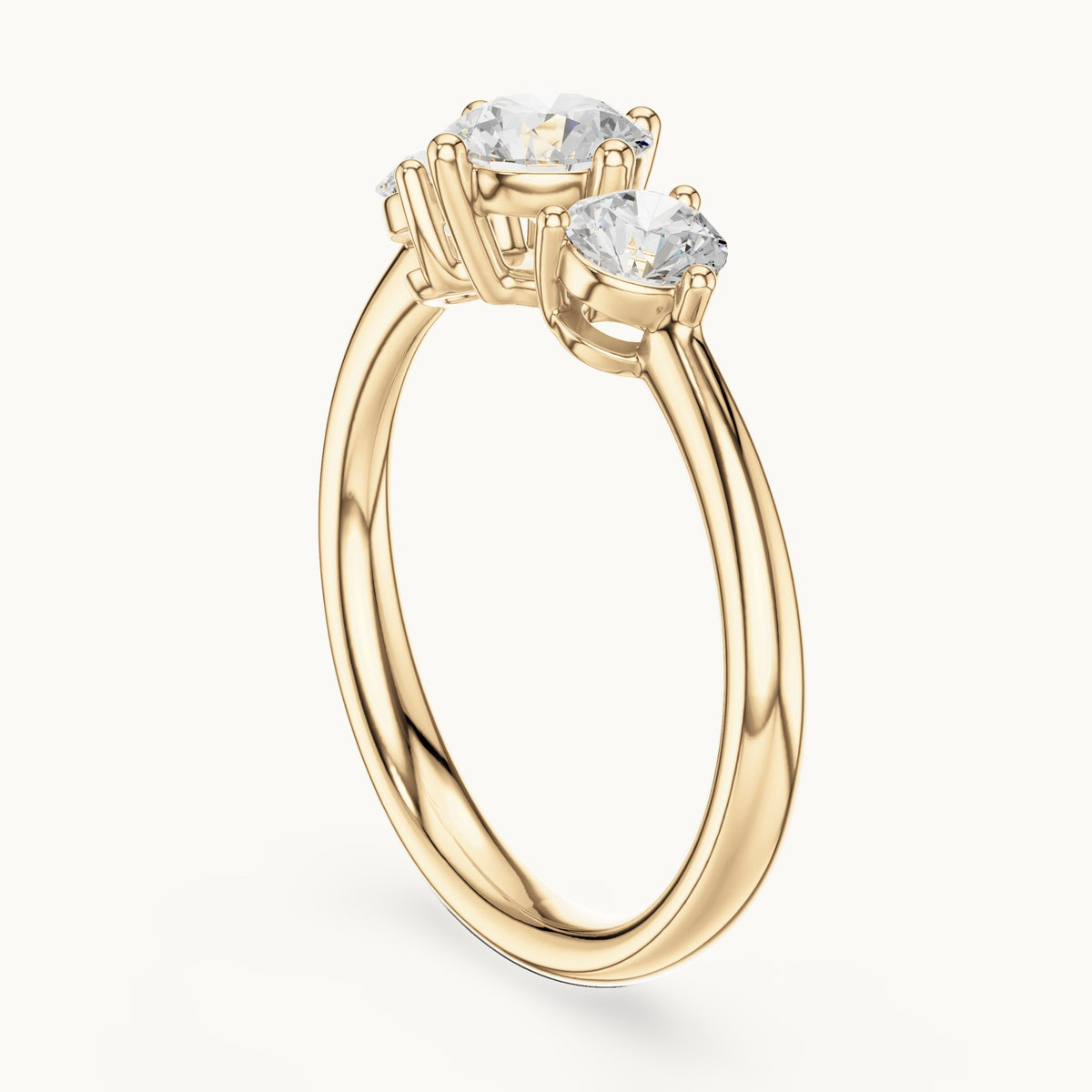 Round lab-grown diamond three-stone engagement ring in yellow gold, 1.29 CT TW, view 1