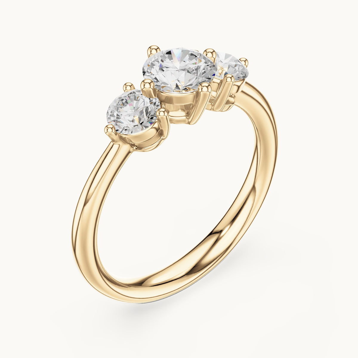 Round lab-grown diamond three-stone engagement ring in yellow gold, 1.29 CT TW, view 2