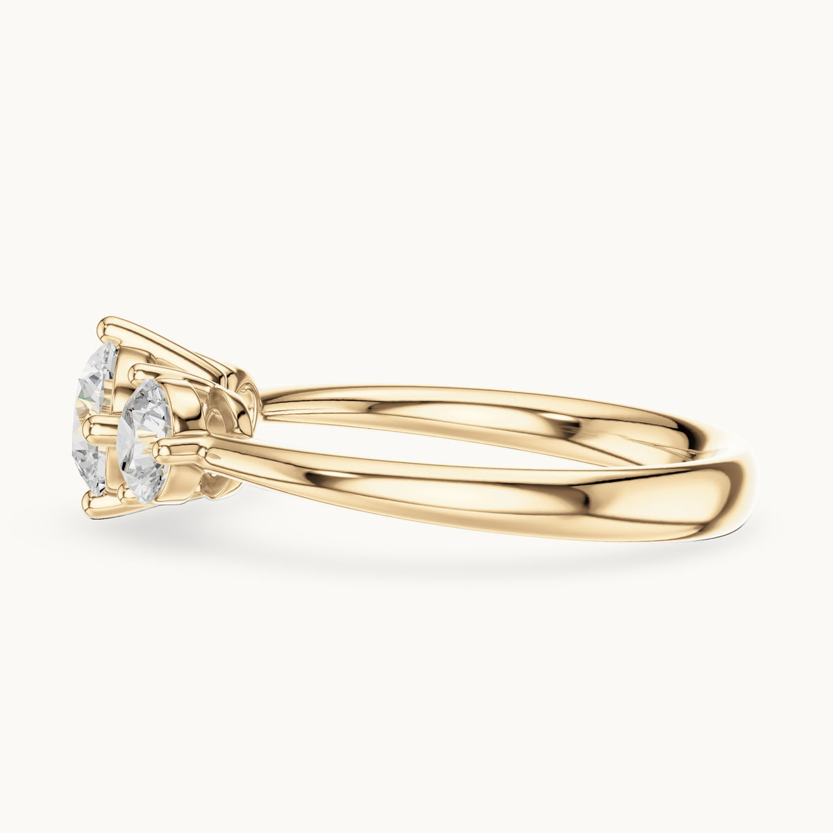 Round lab-grown diamond three-stone engagement ring in yellow gold, 1.29 CT TW, view 3