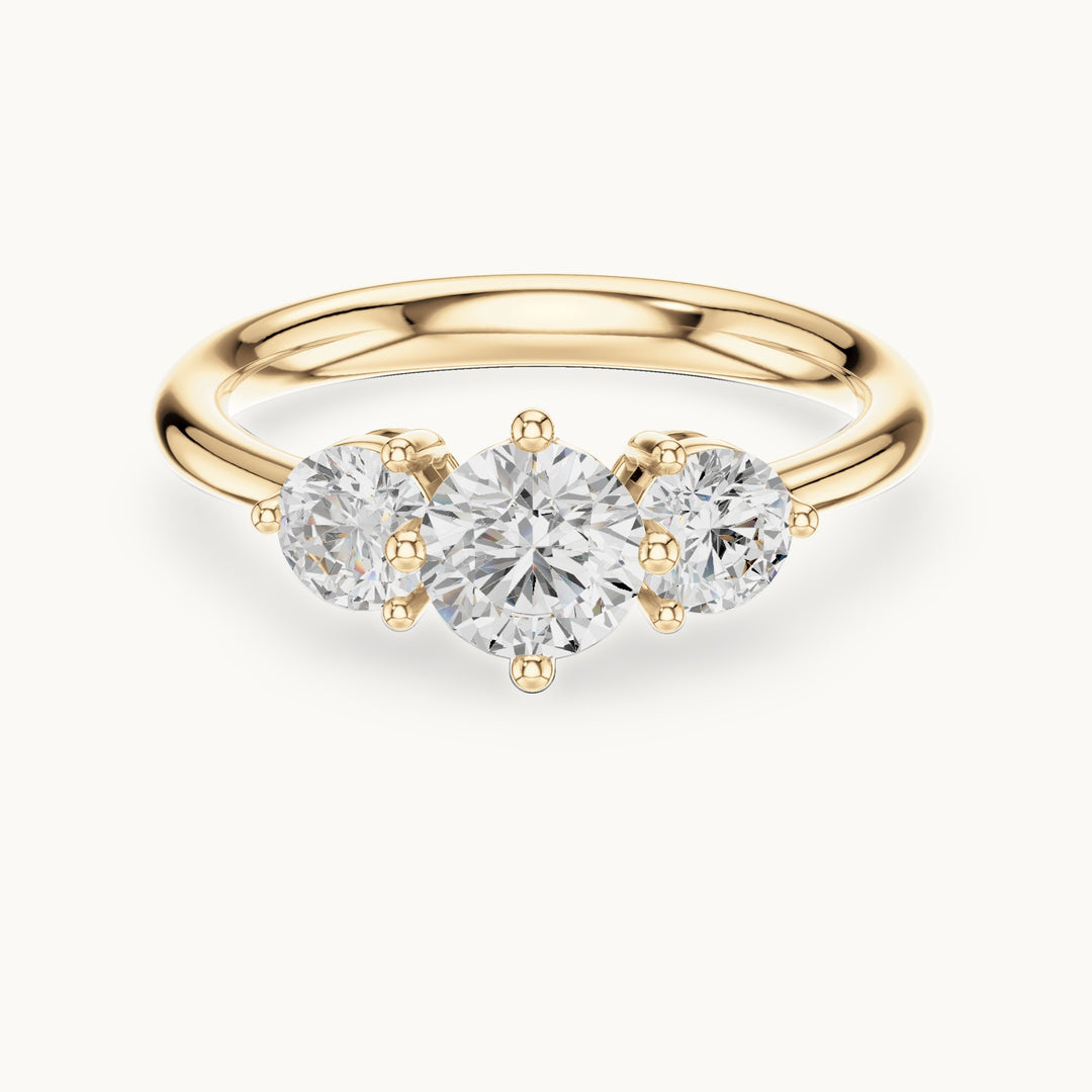Round lab-grown diamond three-stone engagement ring in yellow gold, 1.29 CT TW, view 4