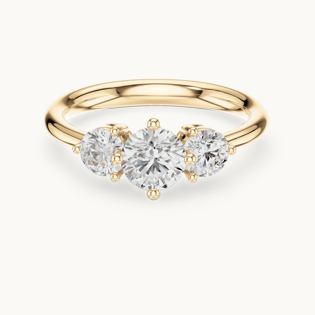 Round lab-grown diamond three-stone engagement ring in yellow gold, 1.29 CT TW, view 4