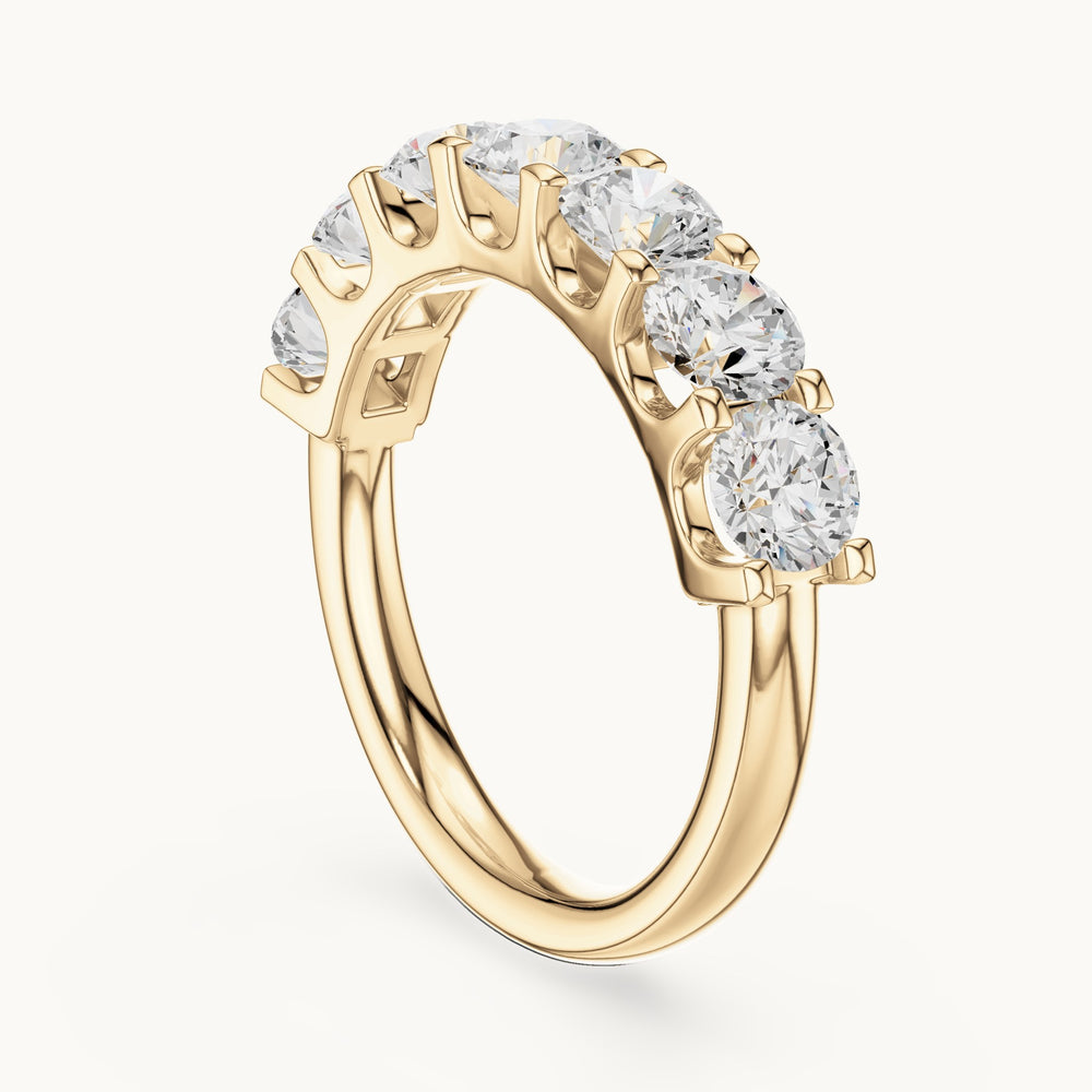 Round lab-grown diamond seven-stone half eternity band in yellow gold, 2.166 CT TW, view 1