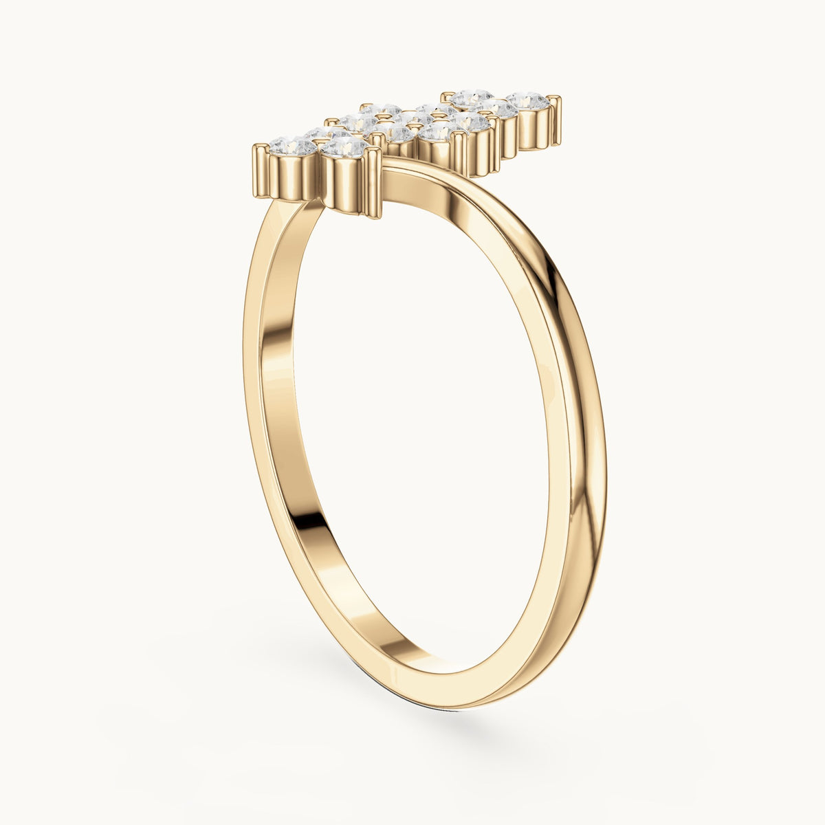 Round lab-grown diamond diagonal cluster bypass ring in yellow gold, 0.20 CT TW, view 1