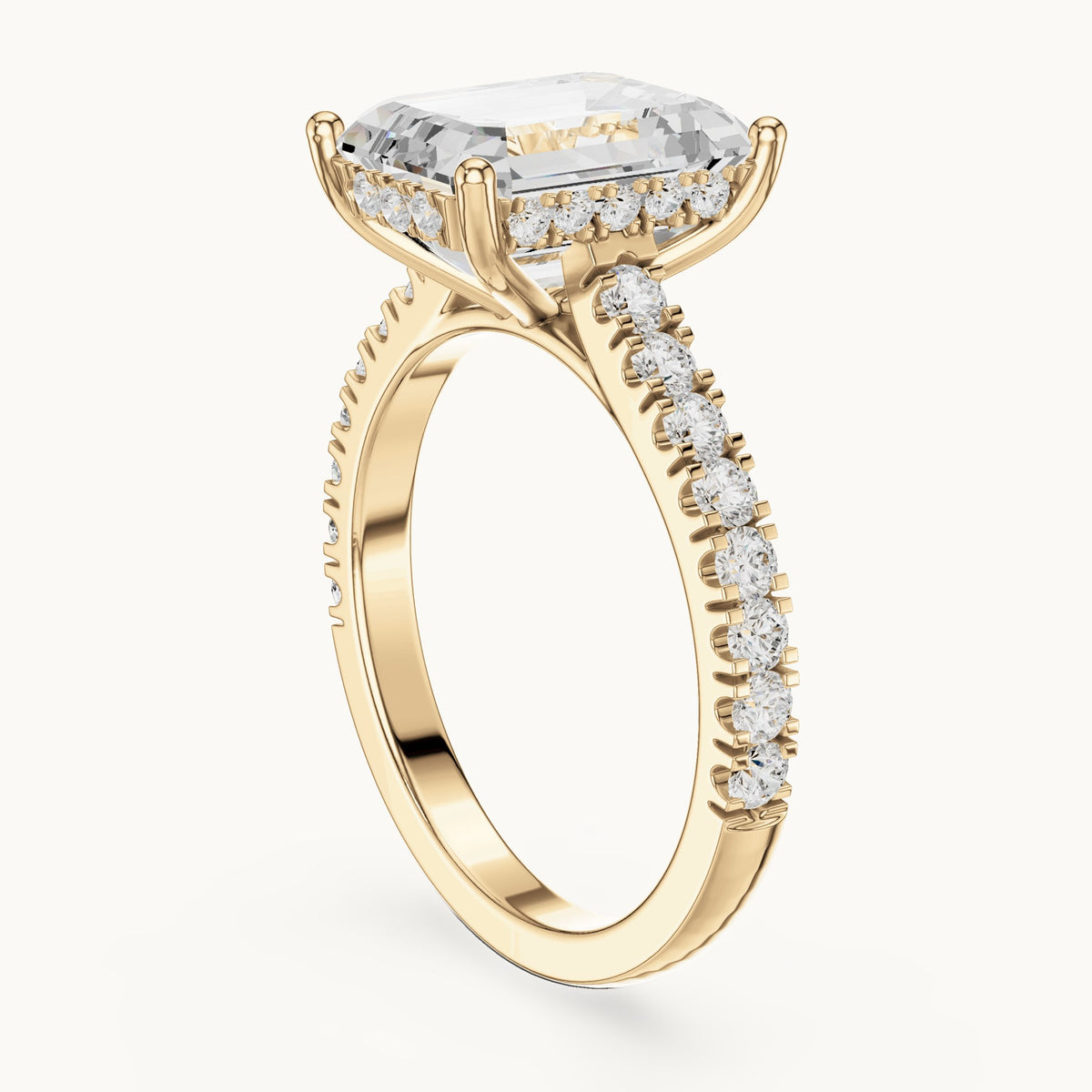 Emerald-cut and round lab-grown diamond hidden halo pavé engagement ring in yellow gold, 4.56 CT TW, view 1