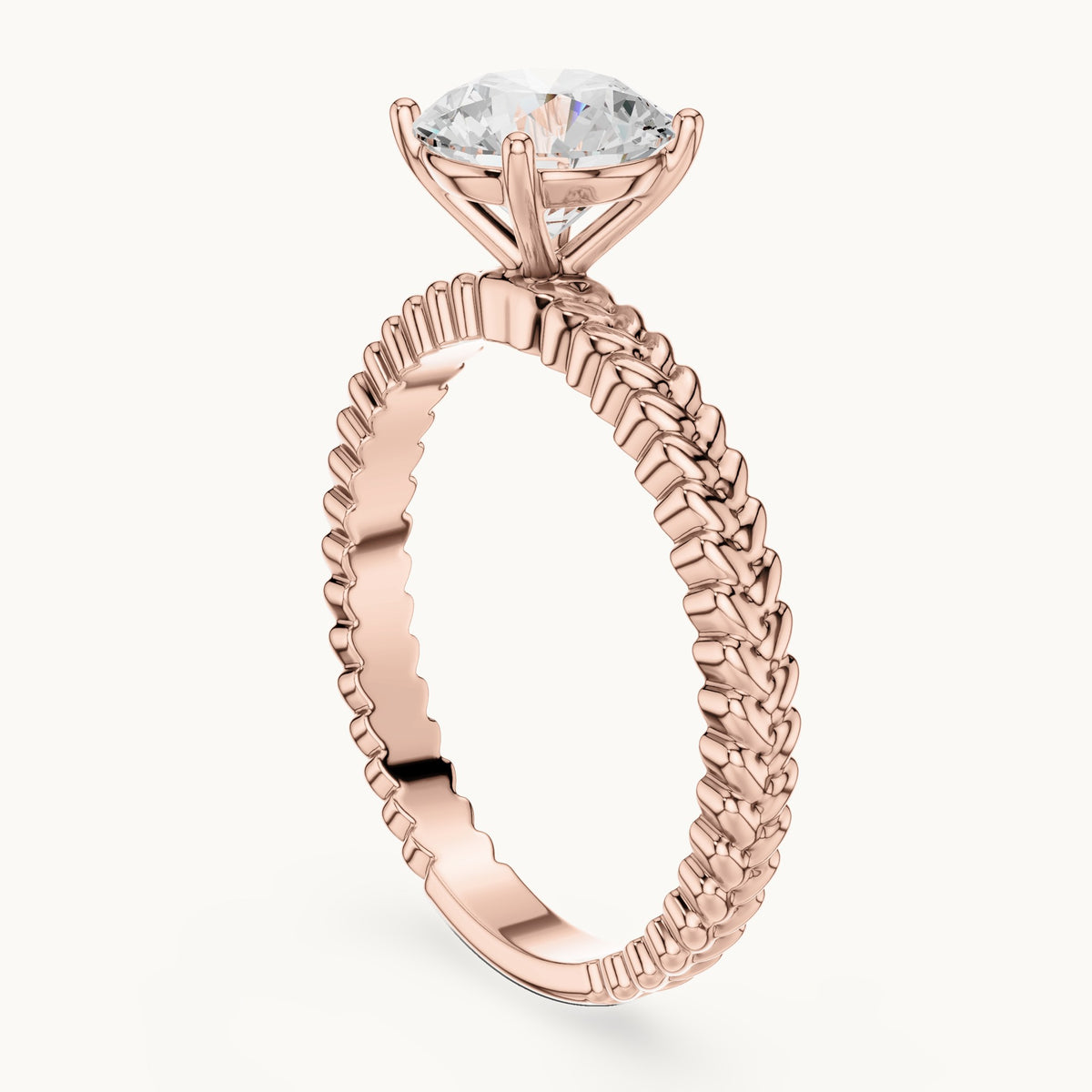 Round lab-grown diamond solitaire engagement ring with braided band in rose gold, 1.25 CT TW, view 1