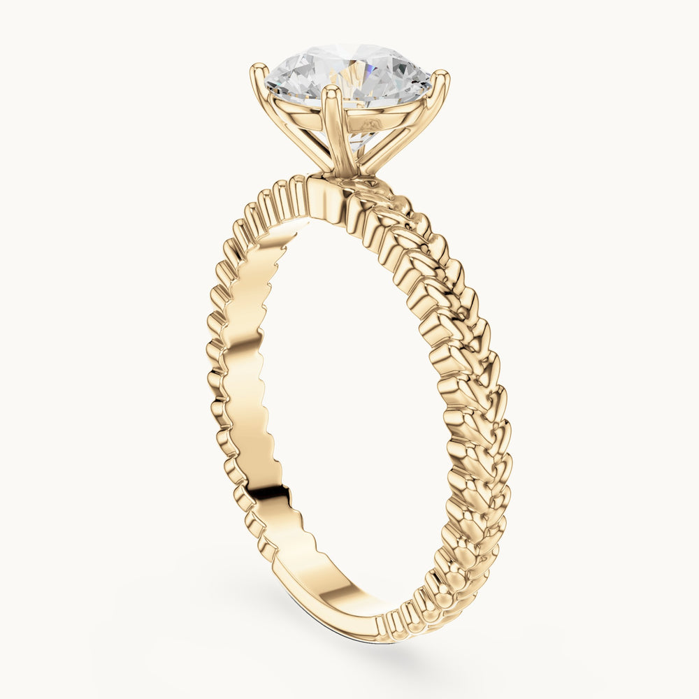 Round lab-grown diamond solitaire engagement ring with braided band in yellow gold, 1.25 CT TW, view 1