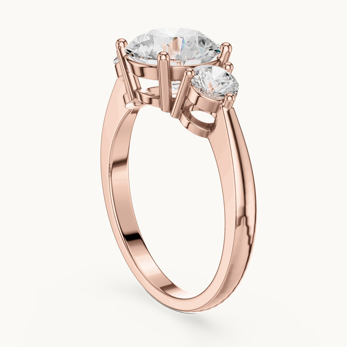 Round lab-grown diamond three-stone engagement ring in rose gold, 2.446 CT TW, view 1
