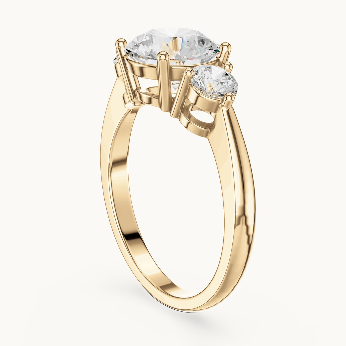 Round lab-grown diamond three-stone engagement ring in yellow gold, 2.446 CT TW, view 1