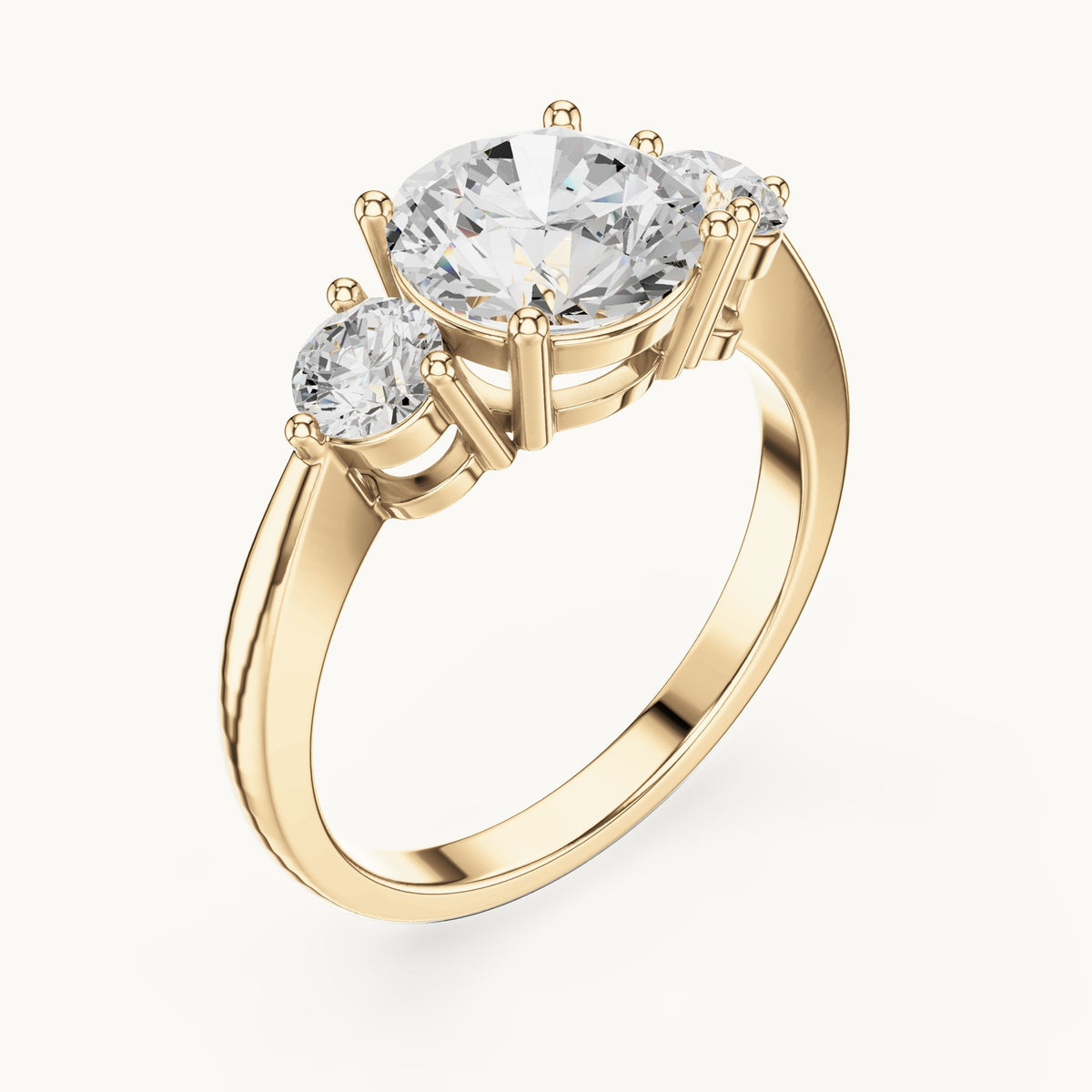Round lab-grown diamond three-stone engagement ring in yellow gold, 2.446 CT TW, view 2