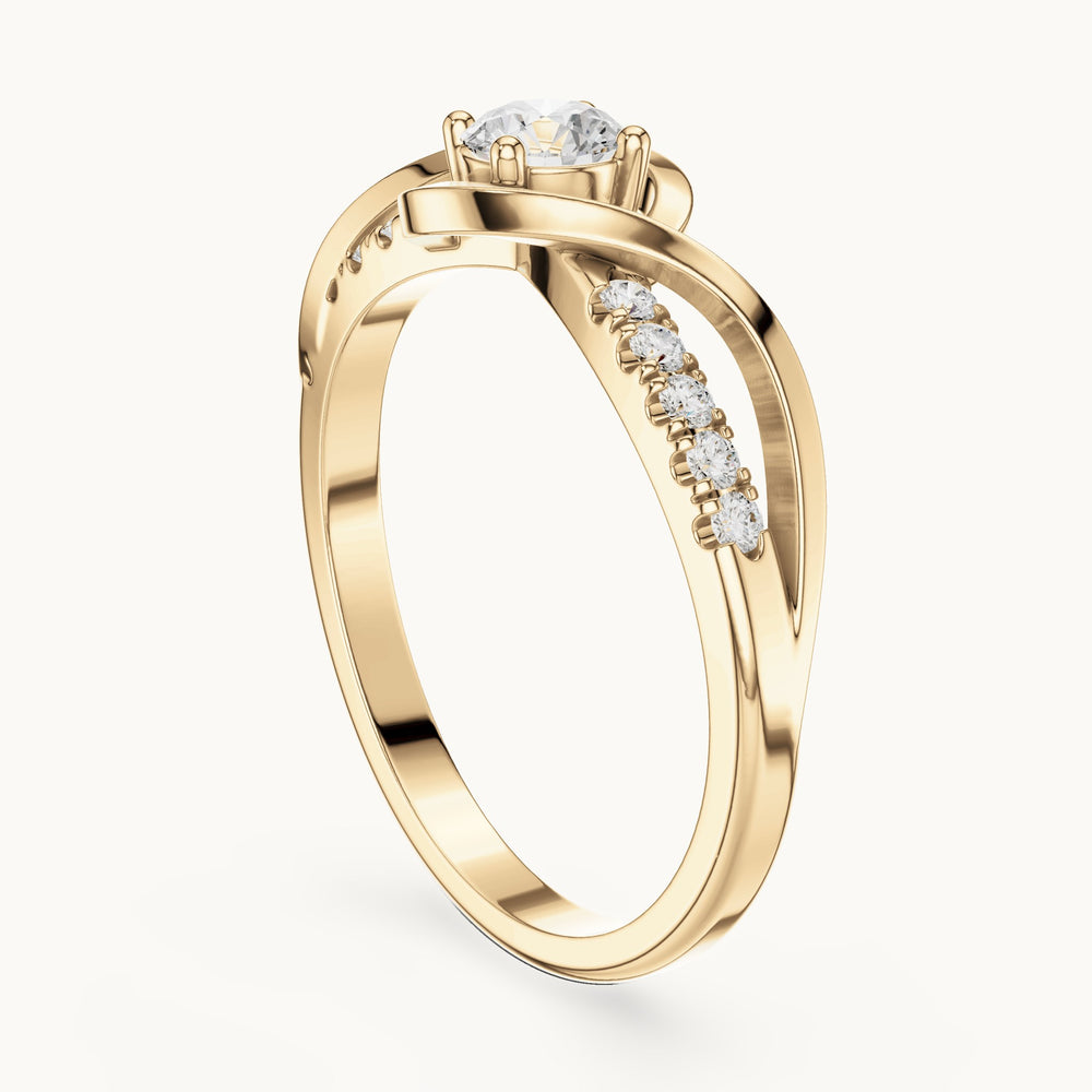 Round lab-grown diamond twisted bypass engagement ring with pavé shoulders in yellow gold, 0.37 CT TW, view 1