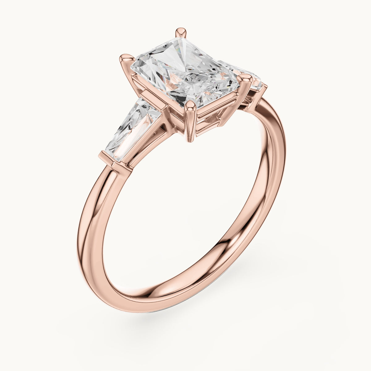 Radiant-cut lab-grown diamond three-stone engagement ring with tapered baguettes in rose gold, 2.07 CT TW, view 2