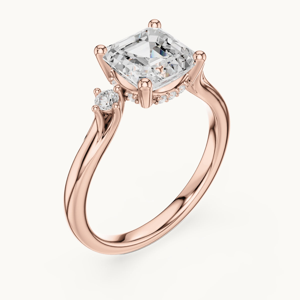Square emerald-cut and round lab-grown diamond three-stone engagement ring with hidden halo in rose gold, 1.93 CT TW, view 2
