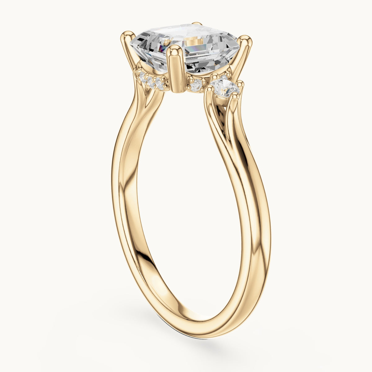 Square emerald-cut and round lab-grown diamond three-stone engagement ring with hidden halo in yellow gold, 1.93 CT TW, view 1