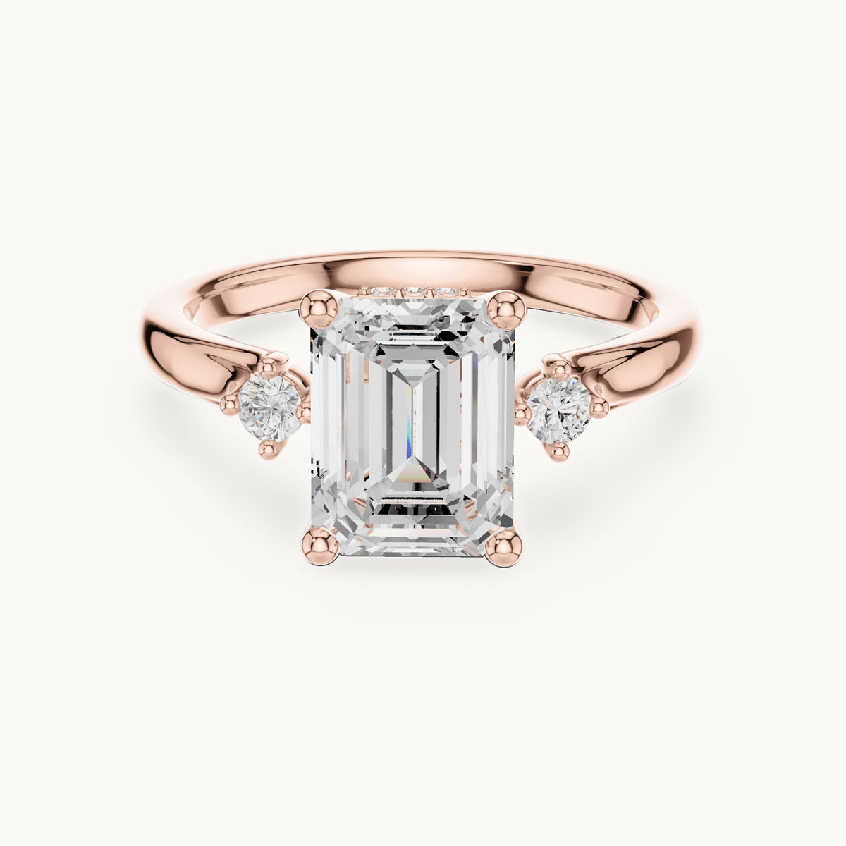 Emerald-cut and round lab-grown diamond three-stone engagement ring with hidden halo in rose gold, 2.23 CT TW, view 4