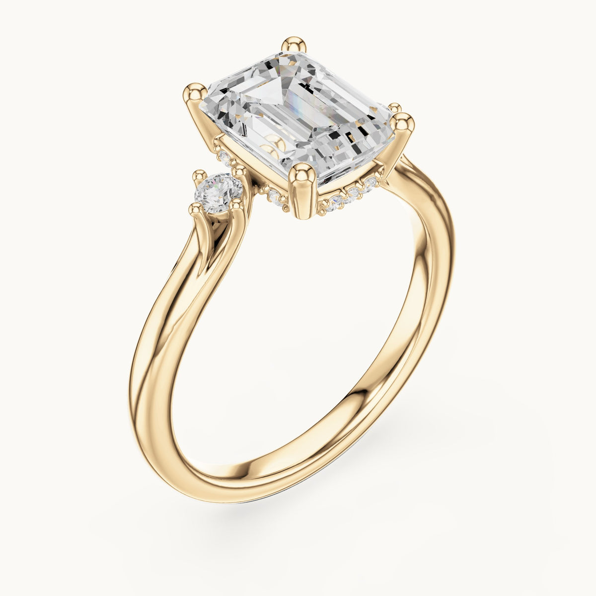 Emerald-cut and round lab-grown diamond three-stone engagement ring with hidden halo in yellow gold, 2.23 CT TW, view 2