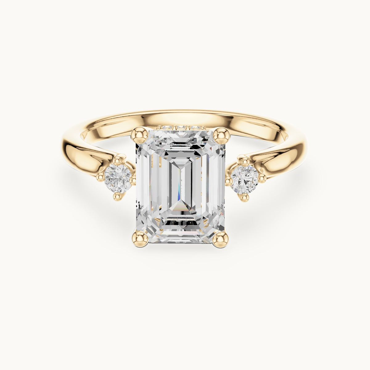 Emerald-cut and round lab-grown diamond three-stone engagement ring with hidden halo in yellow gold, 2.23 CT TW, view 4