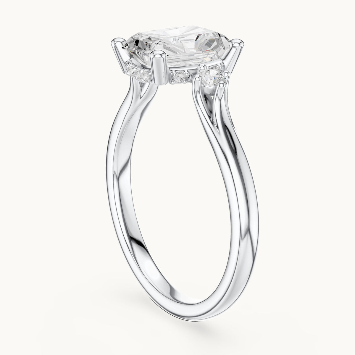 Radiant-cut and round lab-grown diamond three-stone engagement ring with hidden halo in white gold, 2.13 CT TW, view 1