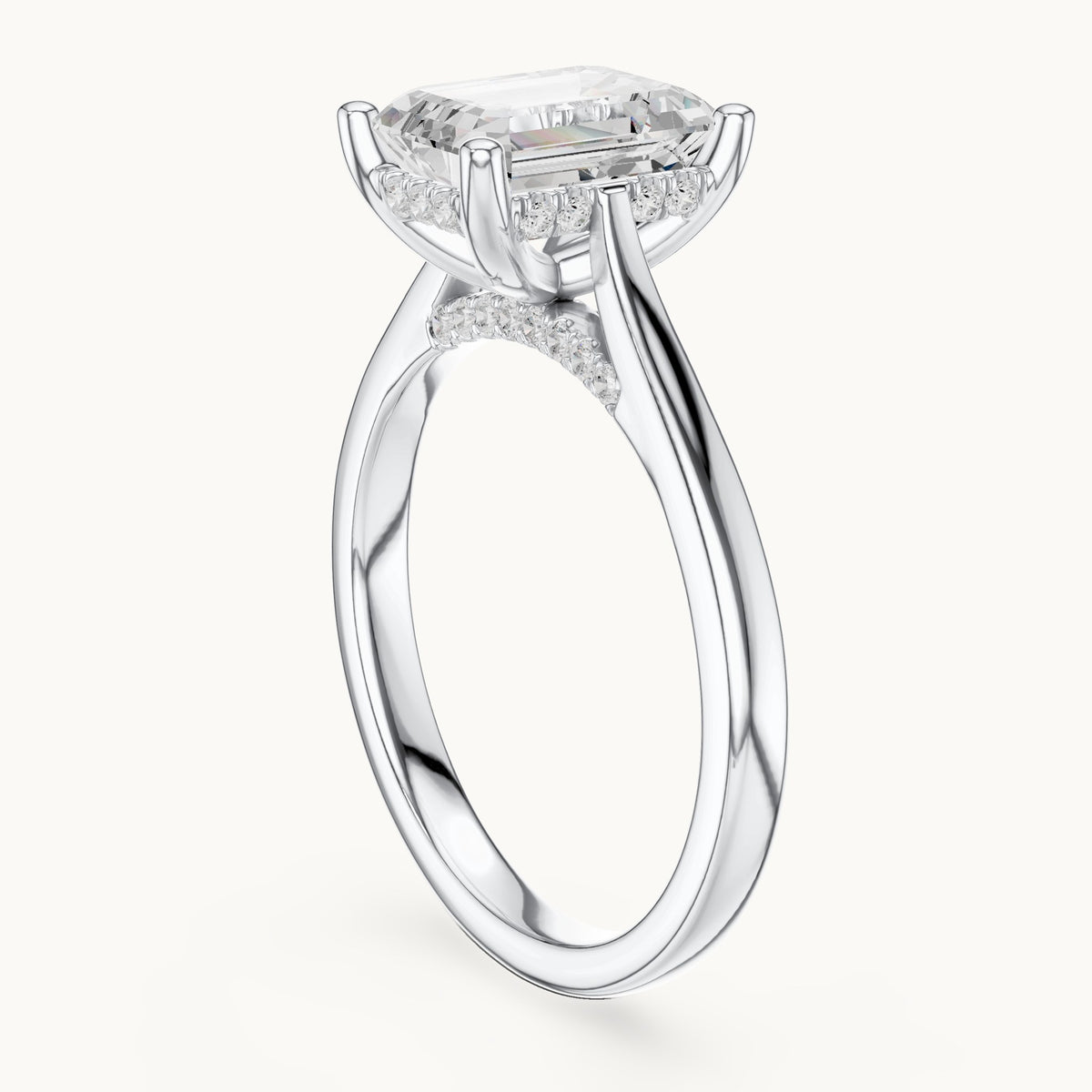 Emerald-cut and round lab-grown diamond hidden halo solitaire engagement ring in white gold, 2.23 CT TW, view 1