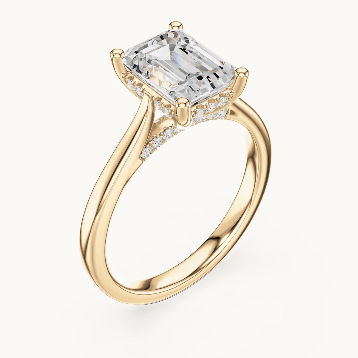 Emerald-cut and round lab-grown diamond hidden halo solitaire engagement ring in yellow gold, 2.23 CT TW, view 2