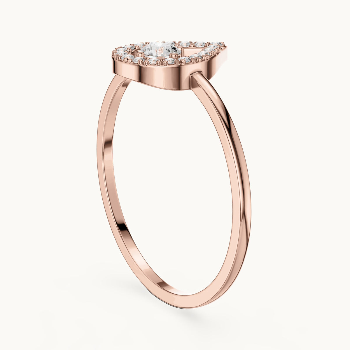 Round lab-grown diamond teardrop halo ring in rose gold, 0.18 CT TW, view 1