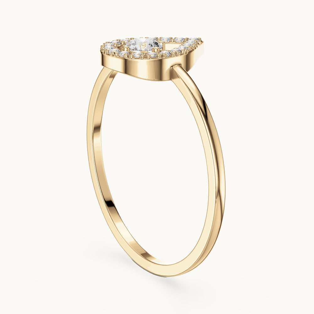 Round lab-grown diamond teardrop halo ring in yellow gold, 0.18 CT TW, view 1