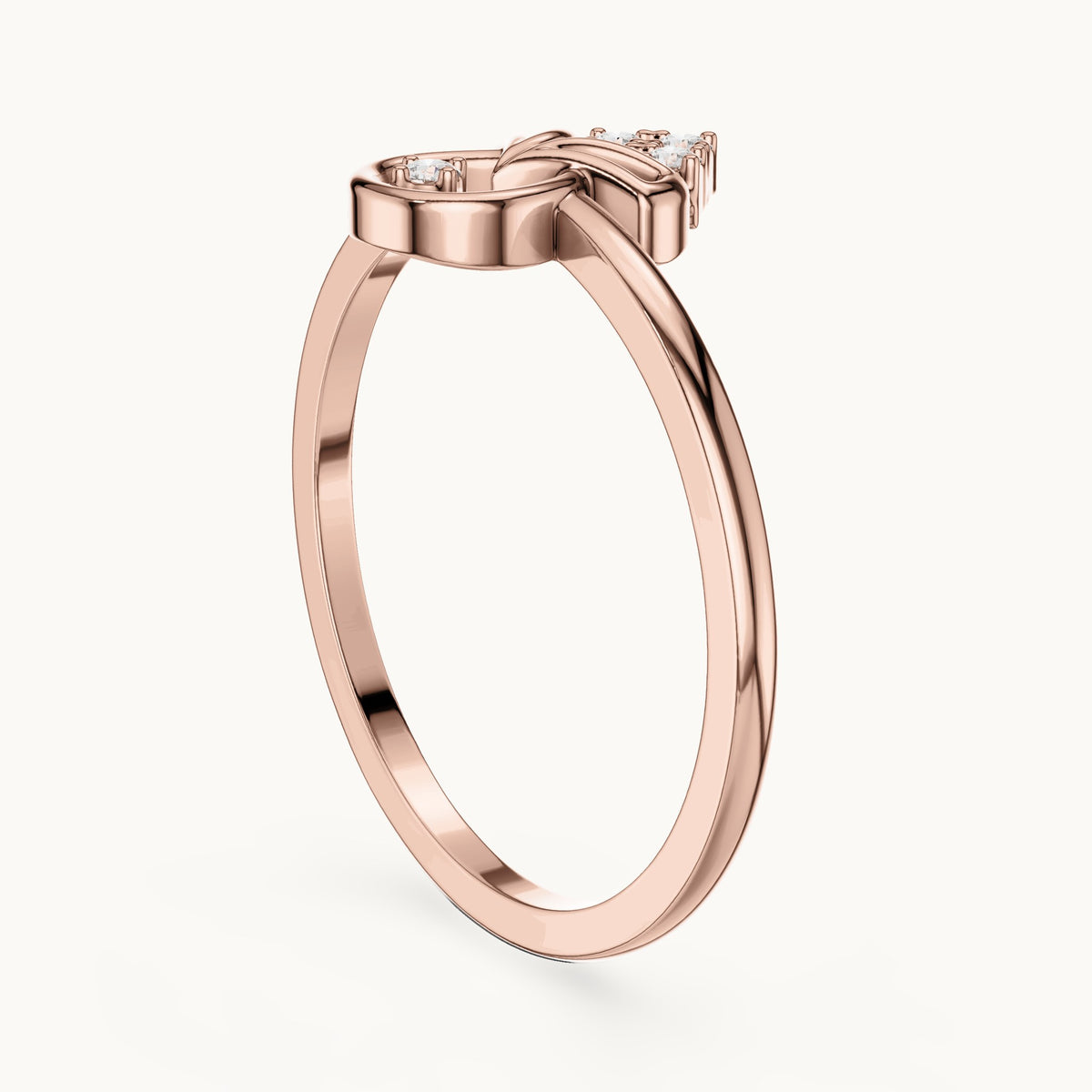 Round lab-grown diamond kite and teardrop ring in rose gold, 0.050 CT TW, view 1