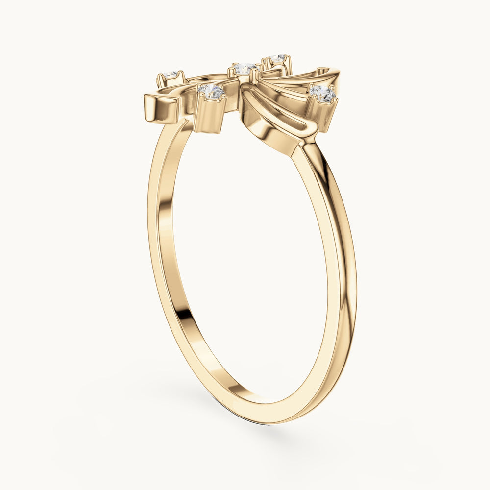 Round lab-grown diamond pinwheel swirl ring in yellow gold, 0.055 CT TW, view 1