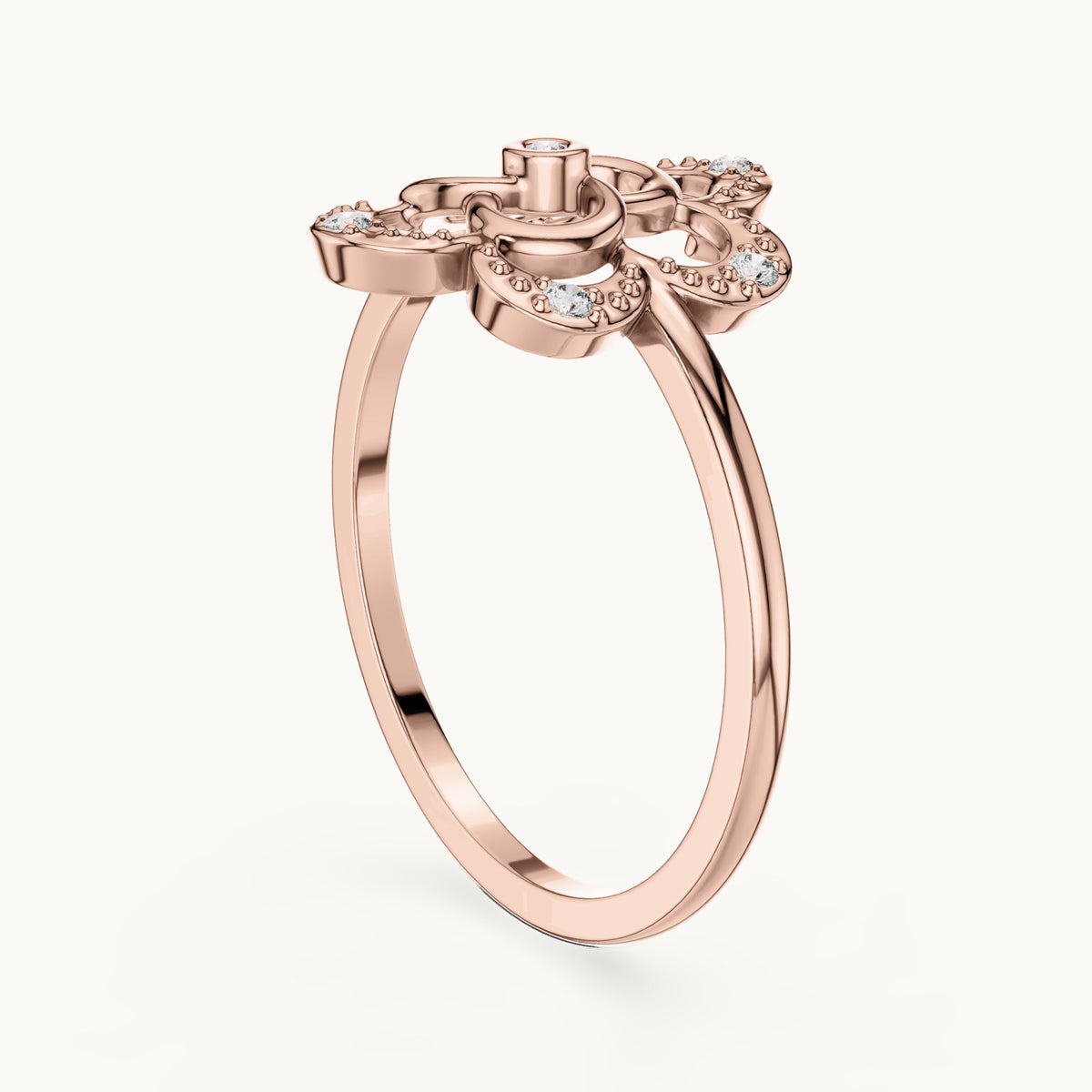 Round lab-grown diamond openwork quatrefoil flower ring in rose gold, 0.068 CT TW, view 1