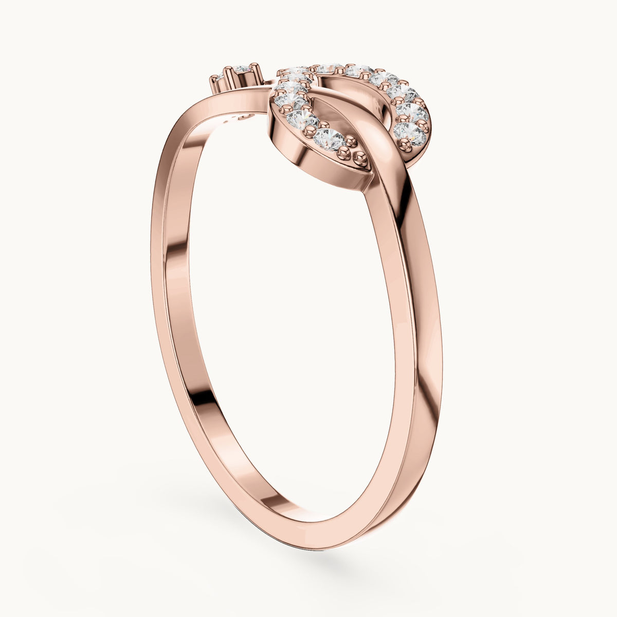 Round lab-grown diamond loop knot ring in rose gold, 0.14 CT TW, view 1
