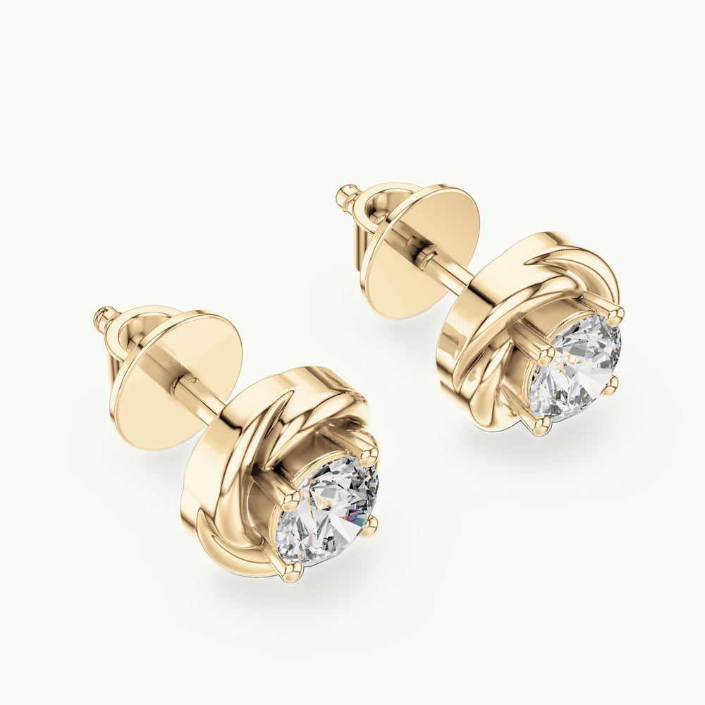 Round lab-grown diamond swirl bezel stud earrings in yellow gold, 0.478 CT TW, view 2