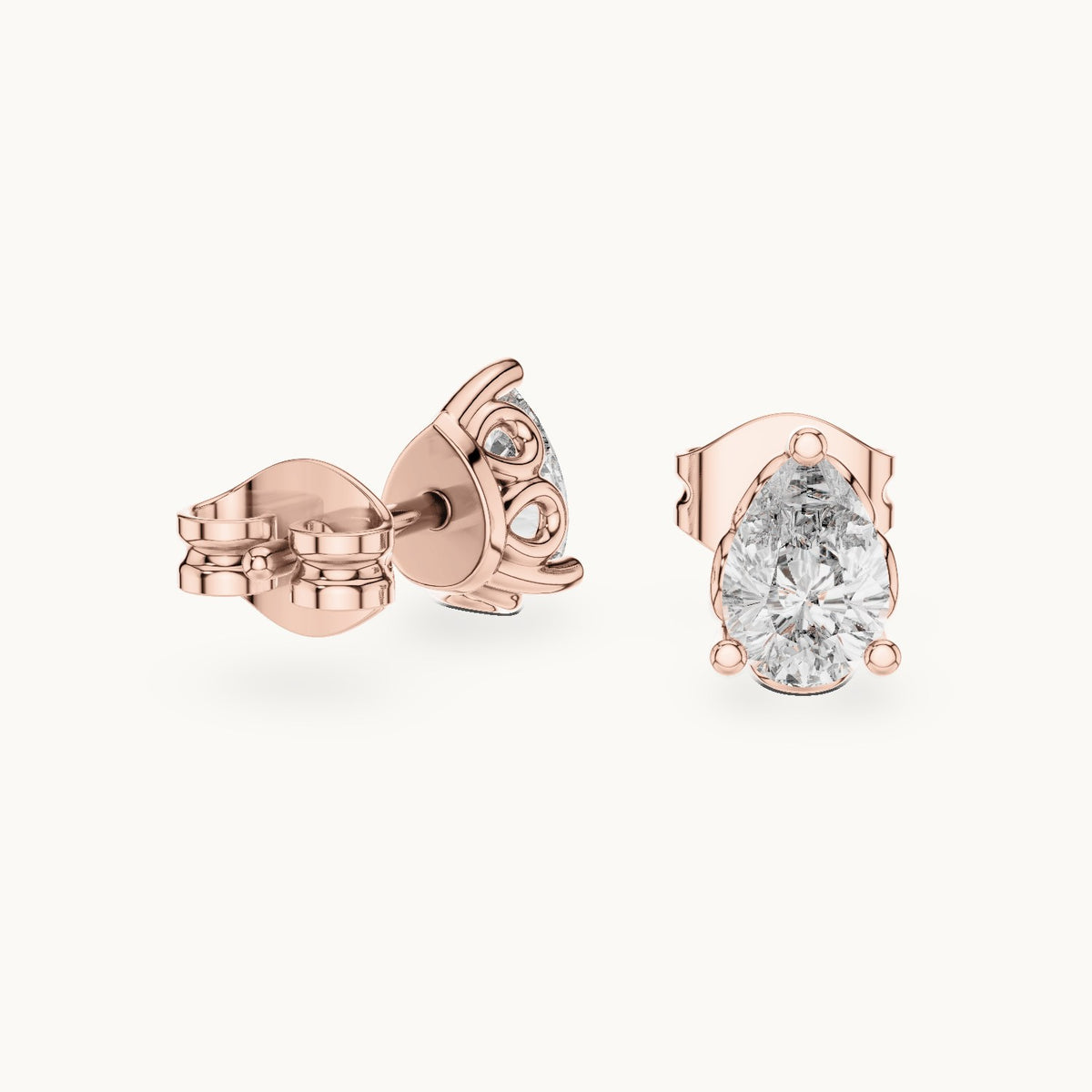 Pear lab-grown diamond solitaire stud earrings in rose gold, 0.95 CT TW, view 1