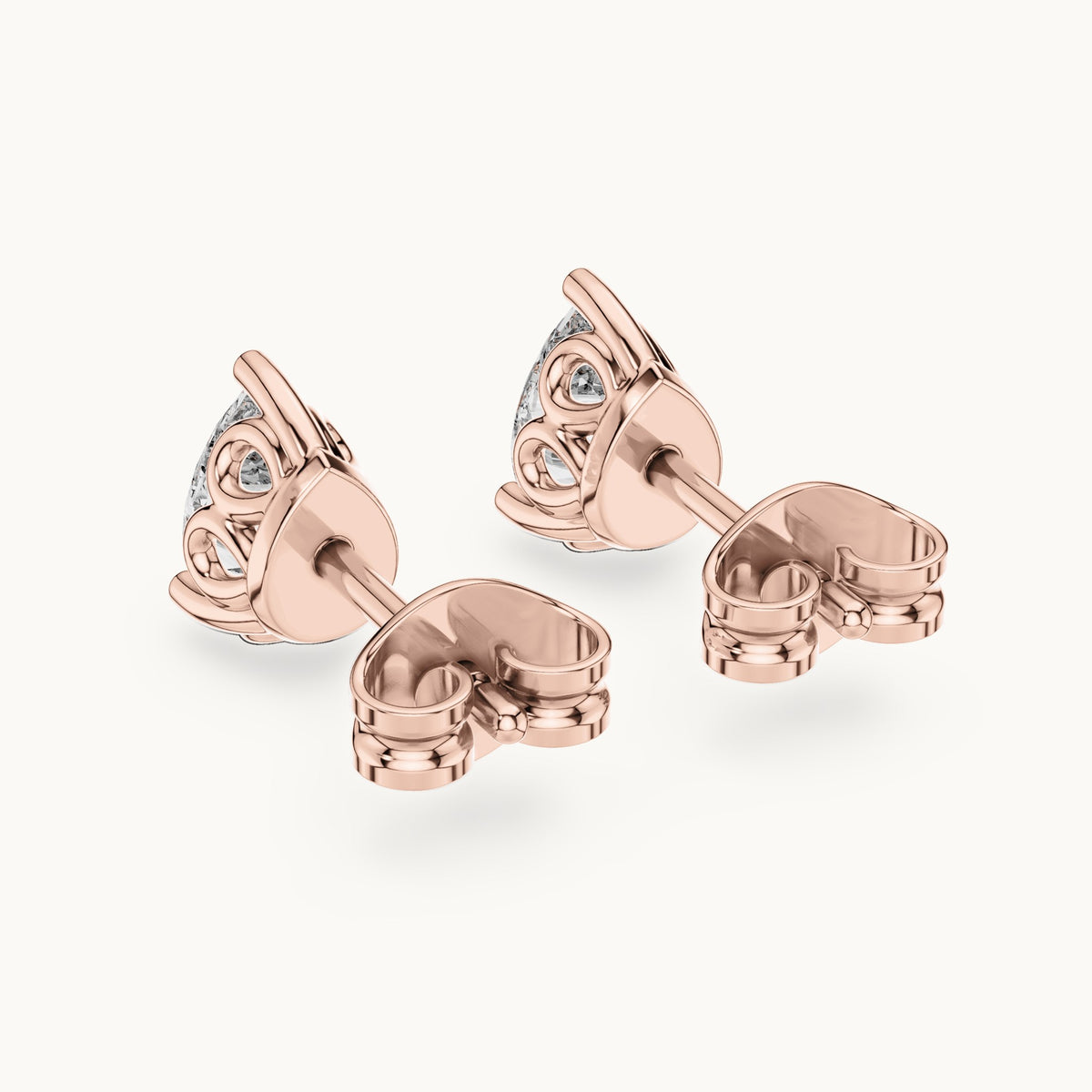 Pear lab-grown diamond solitaire stud earrings in rose gold, 0.95 CT TW, view 3