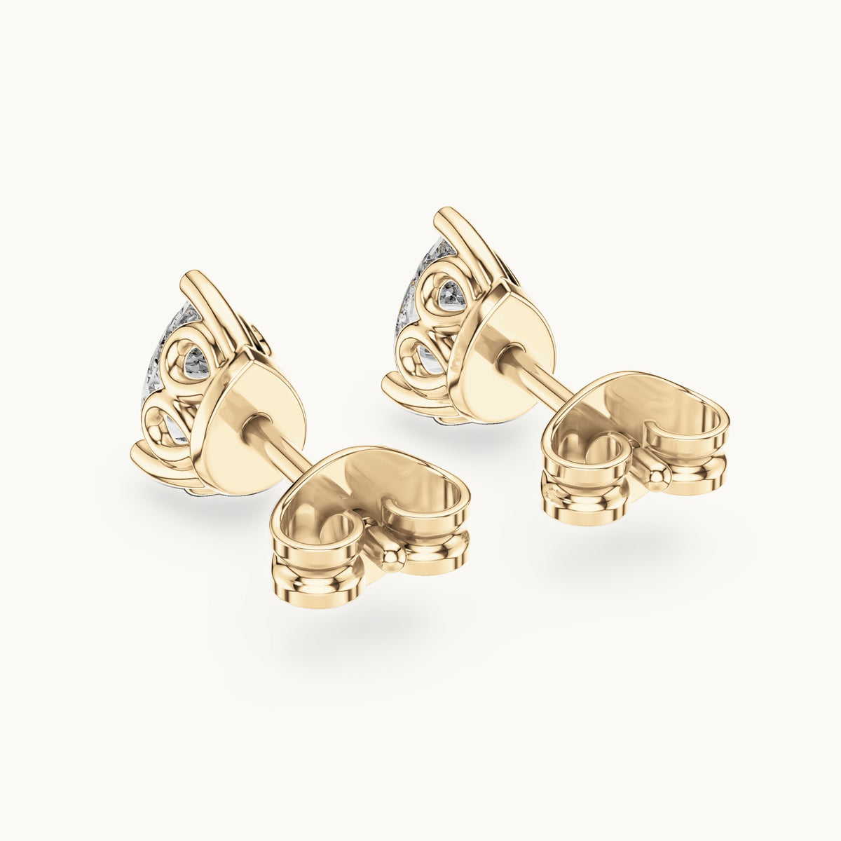 Pear lab-grown diamond solitaire stud earrings in yellow gold, 0.95 CT TW, view 3