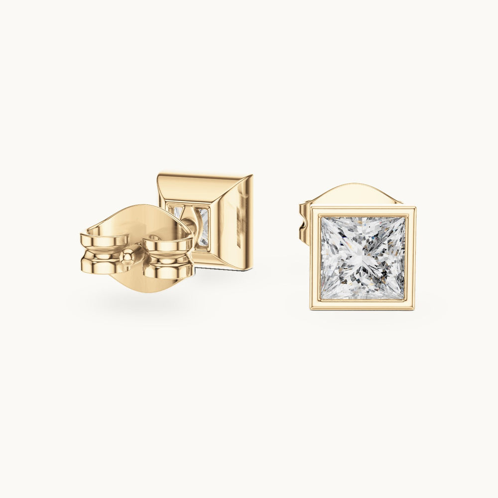 Princess-cut lab-grown diamond bezel solitaire stud earrings in yellow gold, 0.88 CT TW, view 1