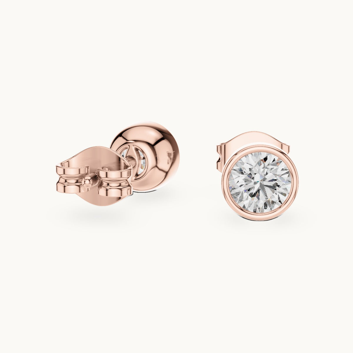 Round lab-grown diamond bezel stud earrings in rose gold, 1.00 CT TW, view 1
