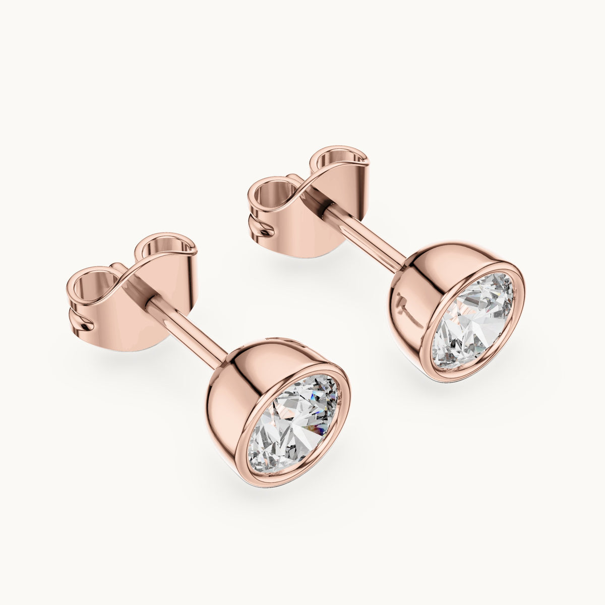 Round lab-grown diamond bezel stud earrings in rose gold, 1.00 CT TW, view 2