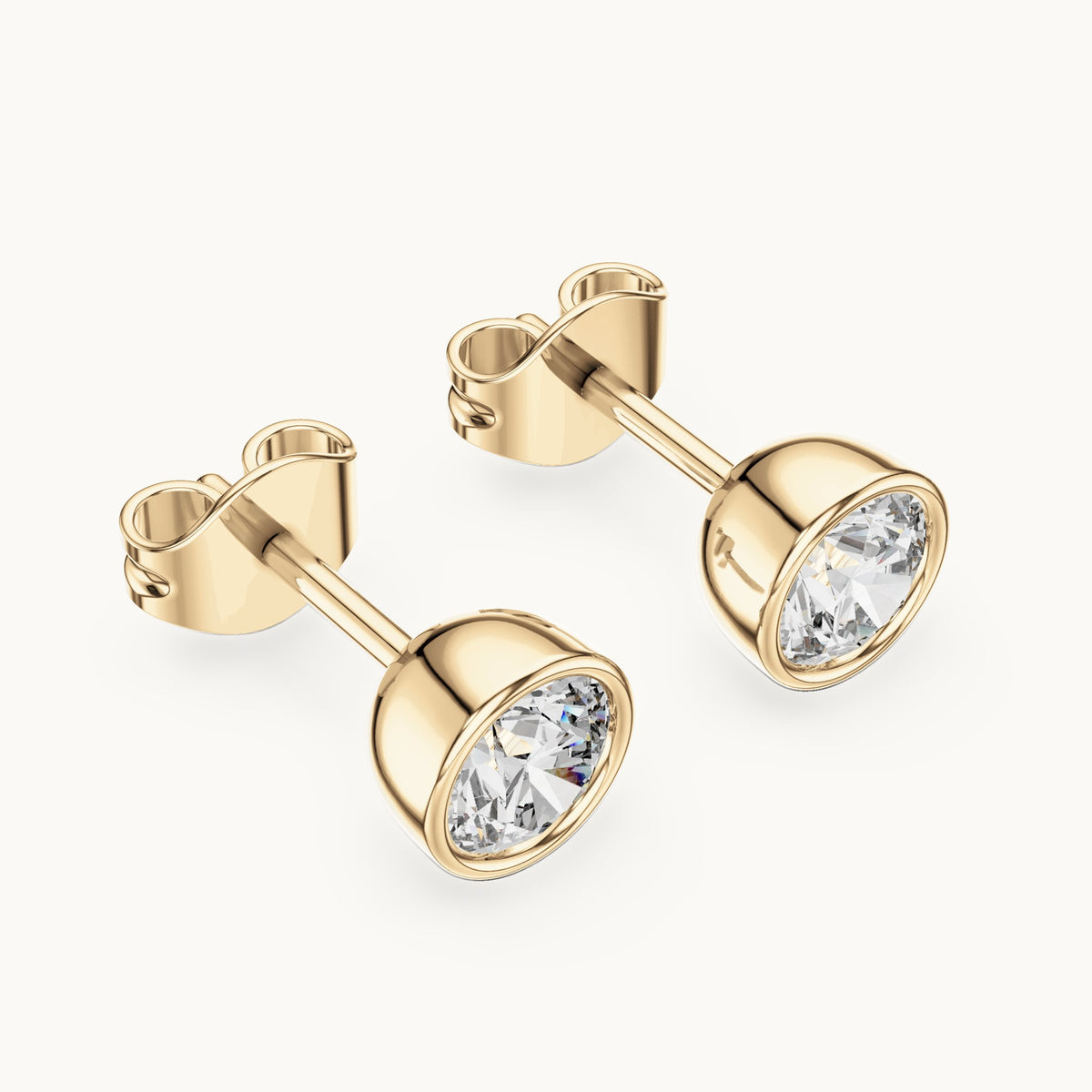 Round lab-grown diamond bezel stud earrings in yellow gold, 1.00 CT TW, view 2