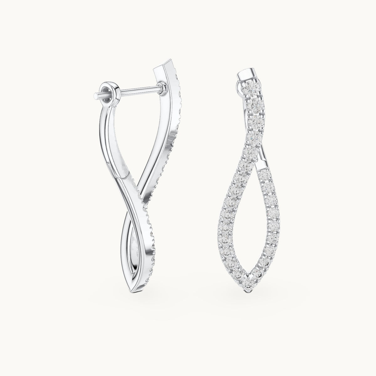 Round lab-grown diamond wave drop earrings in white gold, 0.788 CT TW, view 1